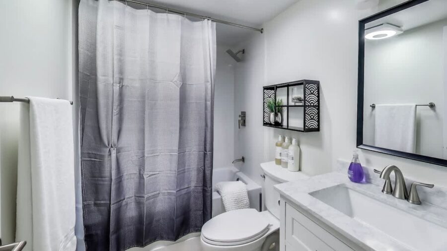 full bathroom  has everything you need for a refreshing morning shower including Kiehl's shampoo, conditioner, and body wash