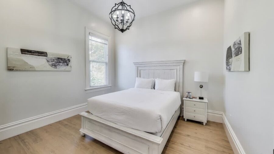 Master bedroom has a queen bed and en suite bathroom.