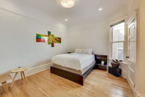 View of the Master Suite queen-sized bed from Master Suite entry...