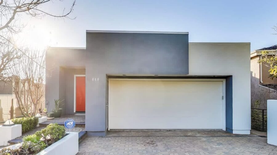 The driveway and entrance to the home.  You may park one large or two compact cars in the driveway.