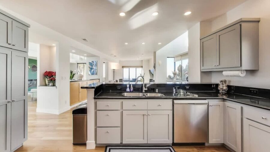 Kitchen counter bar, with seating for two, looking into the dining and family room
