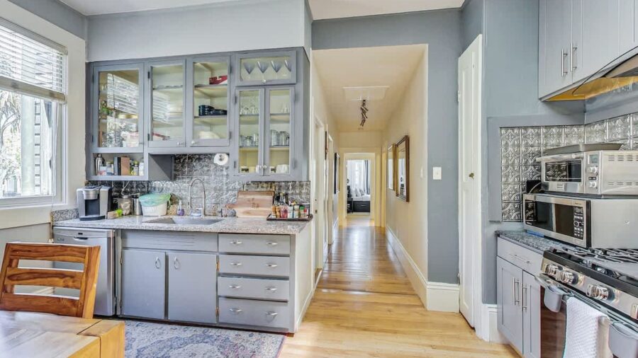 Bright, open full kitchen.  It's cozy but has everything you need to cook your own meals. 