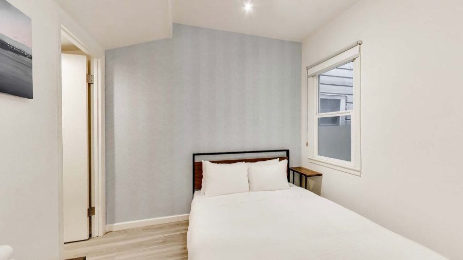 Small bedroom with large walk-in closet
