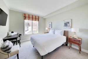 Your private bedroom, next to the shared bathroom has a full closet, desk, television and queen size bed